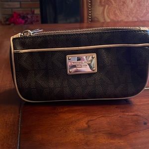 Michael Kors cosmetic bag. Good condition.